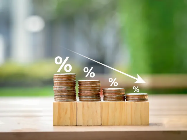 percent sign and coins